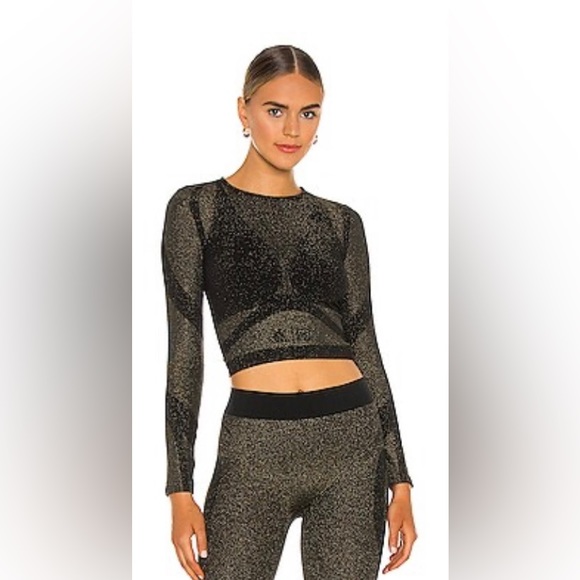 NWT. Wolford STUDIO MOTION CROP Size M
ADIDAS X WOLFORD
Black/Gold - Picture 1 of 6